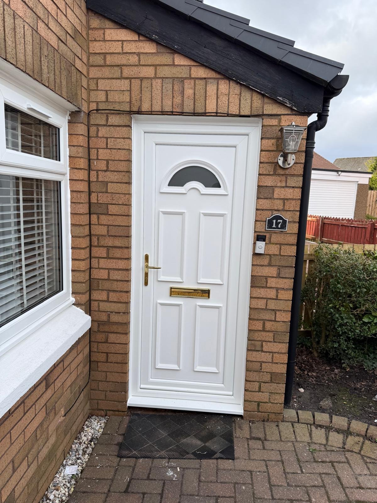 Anthracite composite front door with sidelights, fitted by Betterview Windows & Doors at a Glasgow home