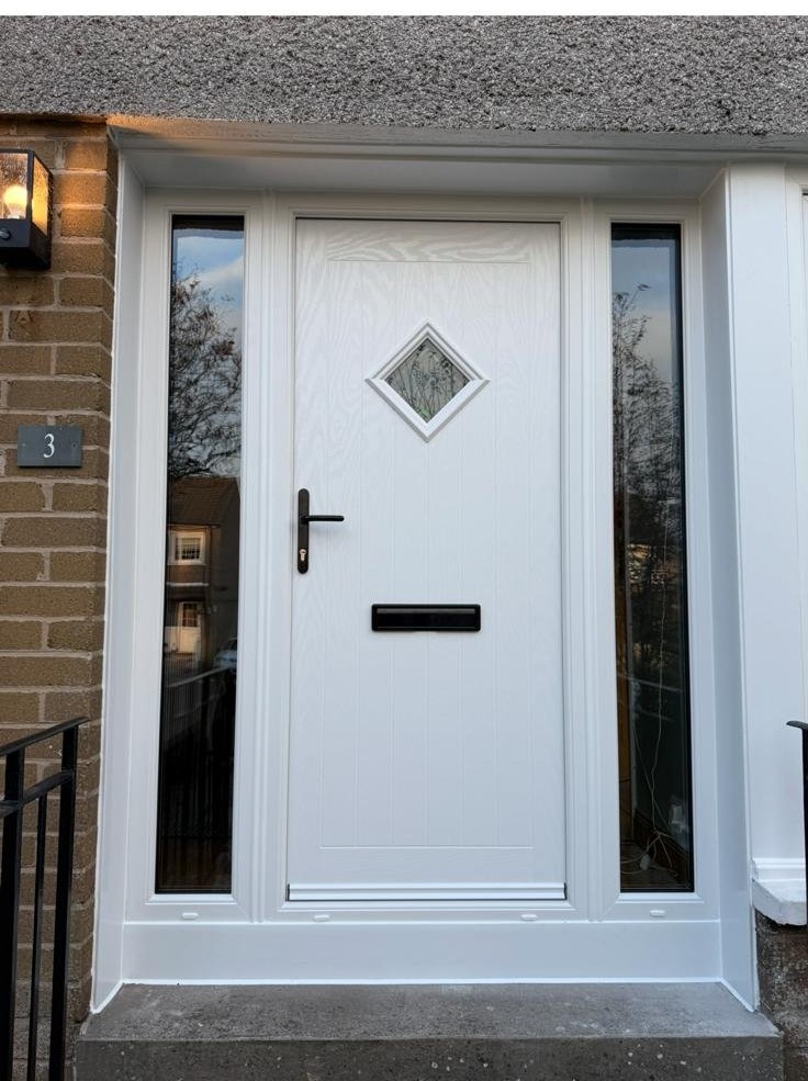 White composite front door with diamond leaded glass and matching side light panels